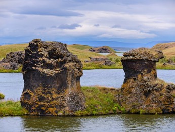 Lava chimneys, rock formations created during the cooling of a lava flow,  Hoefdi nature reserve. Landscape at lake Myvatn. Europe, Northern Europe, Iceland