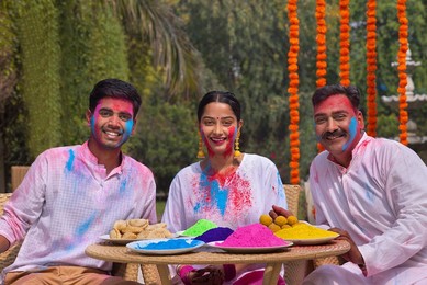 Happy Family celebrating Holi together