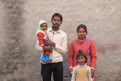 portrait of happy family in rural India