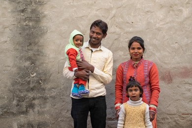 portrait of happy family in rural India