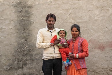 portrait of happy family in rural India