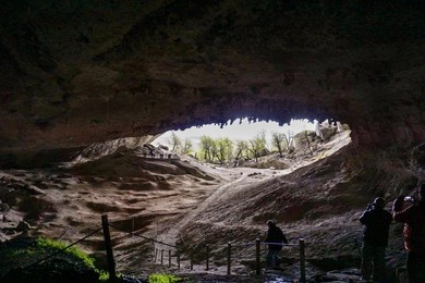 Milodon. cave. natural. monument. landscape. people. horizontal. puerto Natales. cile. patagonia. south America. natural Beauty. natural Park. nature. argentina. outdoor. outdoors. outside