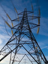 Beneath an immense electricity pylons in Kennington, South Oxford at sunrise