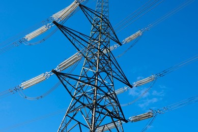 Giant pylon in a field in Kennington Village, spring morning