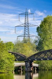 Abandoned railway bridge over the Thames at Kennington, summer morning