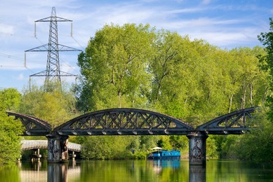 Abandoned railway bridge over the Thames at Kennington, summer morning