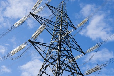 Giant pylon in a field in Kennington Village, spring morning