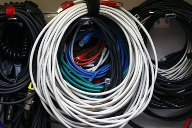 Abstract communication cables background. Wires and connectors for computer audio video. Saint-Gervais Mont-Blanc. France.