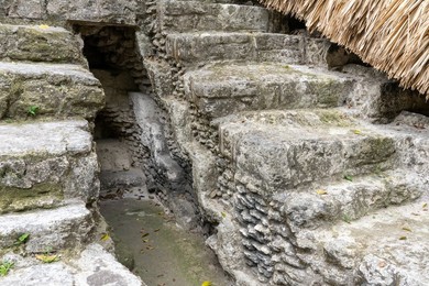Excavation showing earlier construction layers in the North Acropolis in the Mayan ruins in Yaxha-Nakun-Naranjo National Park, Guatemala.  Structure 135.