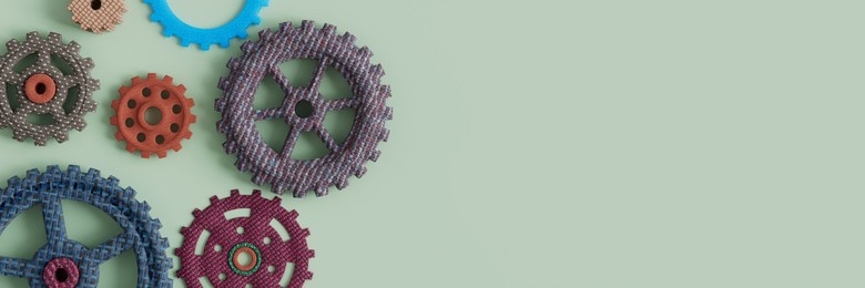 Vibrant soft material gears and cogs for learning engineering concept 3d render