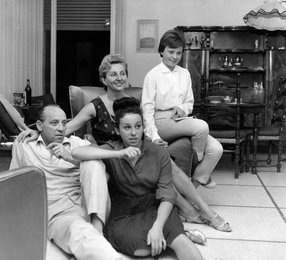 The Beneck family in their house