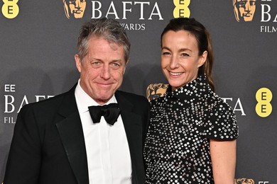 Hugh Grant and Anna Elisabet Eberstein