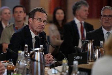 Sweden's Prime Minister Ulf Kristersson listens during the Joint Expeditionary F