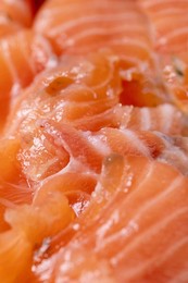 Thinly Sliced Salted Salmon Fillet. Close Up Sea Food Background. Macro Photography