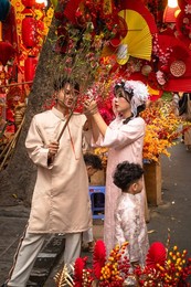 Young family at Tet, Hanoi, Vietnam