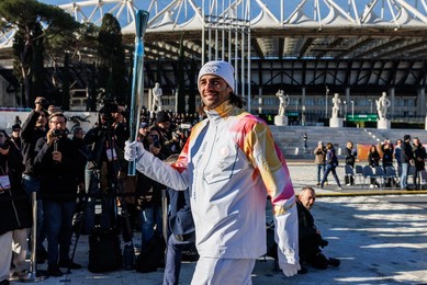The Olympic Torch departs Rome for the 2026 Milan-Cortina Winter Olympics.