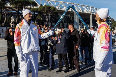 The Olympic Torch departs Rome for the 2026 Milan-Cortina Winter Olympics.