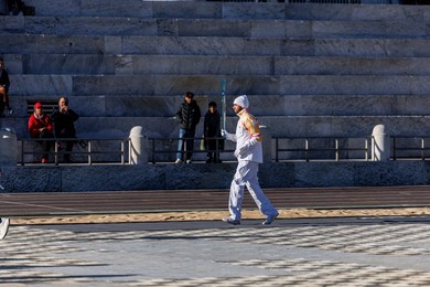 The Olympic Torch departs Rome for the 2026 Milan-Cortina Winter Olympics.
