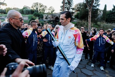 The Olympic Torch departs Rome for the 2026 Milan-Cortina Winter Olympics.
