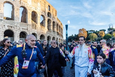 The Olympic Torch departs Rome for the 2026 Milan-Cortina Winter Olympics.