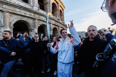 The Olympic Torch departs Rome for the 2026 Milan-Cortina Winter Olympics.