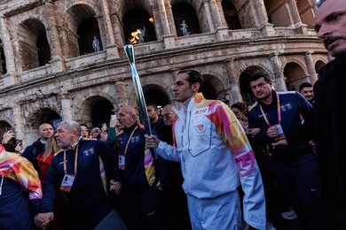The Olympic Torch departs Rome for the 2026 Milan-Cortina Winter Olympics.