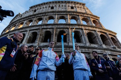 The Olympic Torch departs Rome for the 2026 Milan-Cortina Winter Olympics.