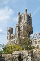 West tower of the "Ship of the Fens"  , Ely Cathedral , standing prominant in Ely, Cambridgeshire, UK.