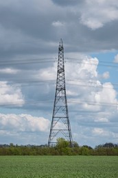 Solar power station and National grid power lines between Soham and wicken, near Ely, cambridgeshire, UK.