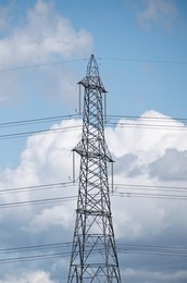 Solar power station and National grid power lines between Soham and wicken, near Ely, cambridgeshire, UK.
