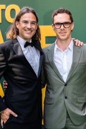 Fredi Devas and Benedict Cumberbatch attend the World Premiere of "How To Live On Earth" at ODEON Luxe Leicester Square on June 22, 2026 in London, England.