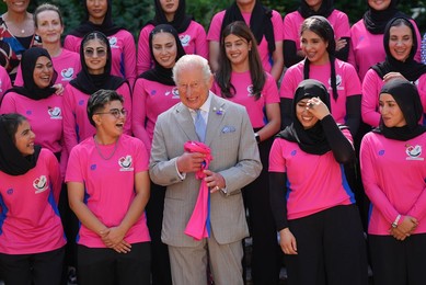 King Charles III meets Afghan Refugee Women's Cricket Team